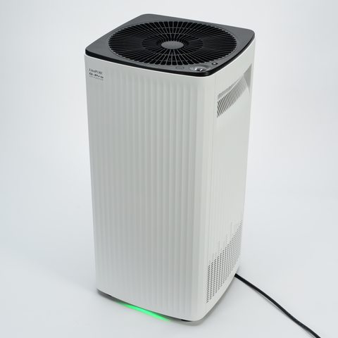 EdenPURE G-Pro Air Purifier by Airdog with white vertical ridged body and black top vent on white background
