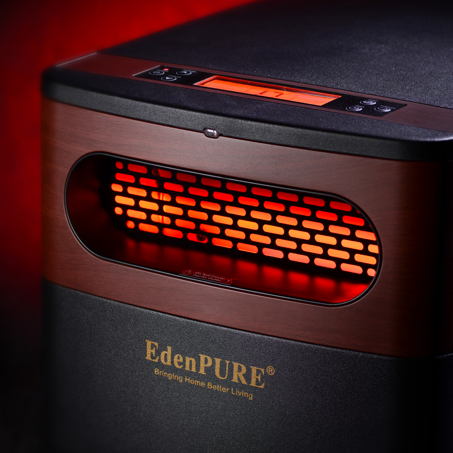 EdenPURE GEN2 Infrared Heater close-up showing glowing heating element and digital control panel on top