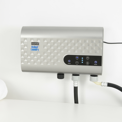EdenPURE Oxileaf Laundry Wash System in silver with digital control panel and connected hoses on white background