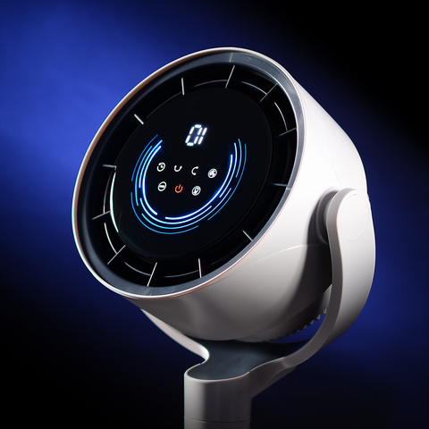 EdenPURE TurboAIR Fan with digital control panel and blue LED lights on white modern stand against blue background