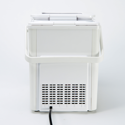 EdenPURE UV IcePRO ice maker rear view showing white body, ventilation grille, handle, and power cord on white background