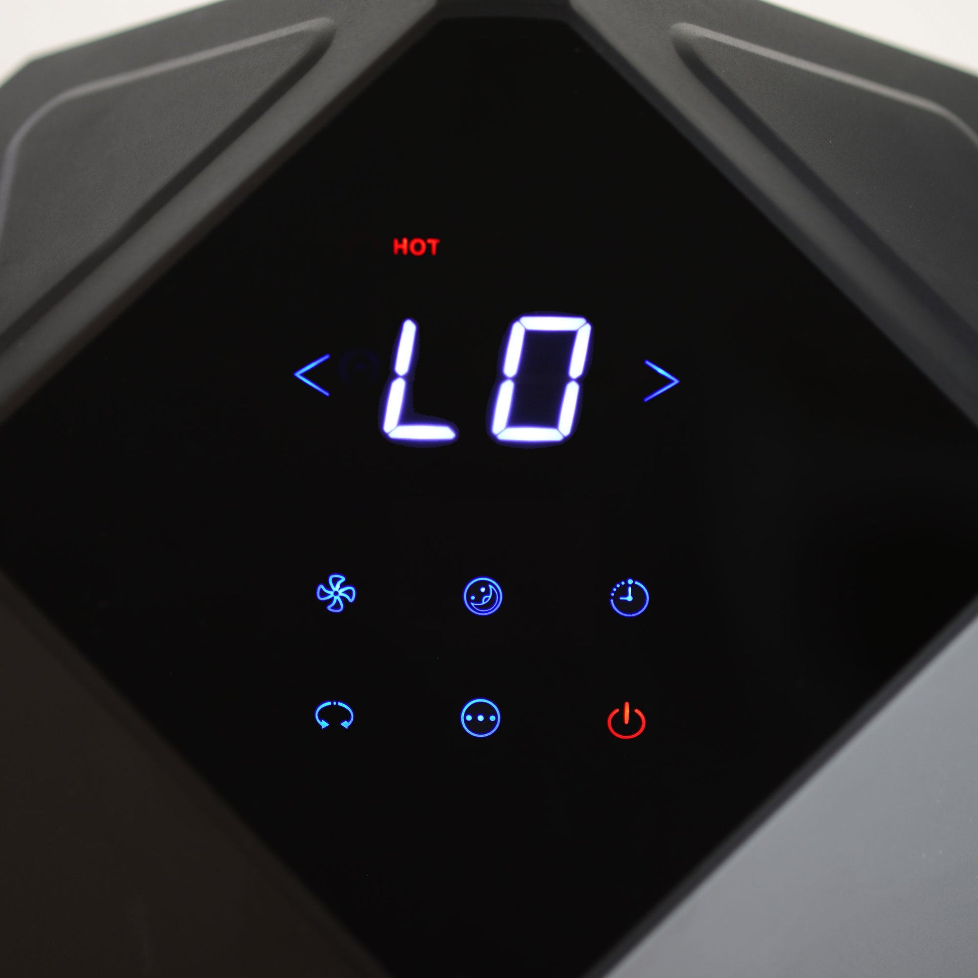 Close-up of EdenPURE 360 Air Fan Heater/Cooler digital control panel displaying low heat setting and function icons